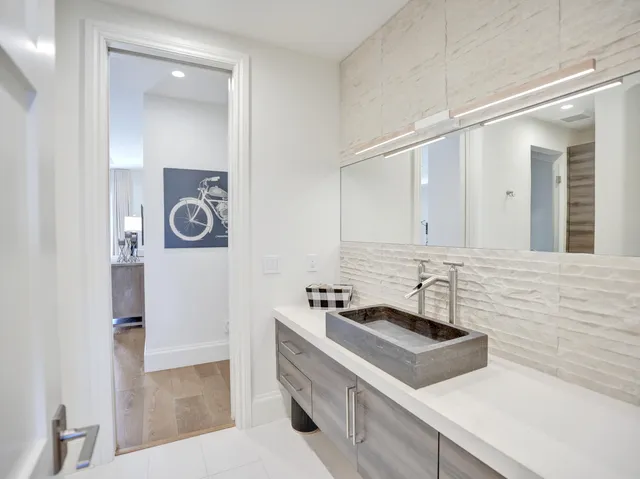 an aerial view of a city with ocean view