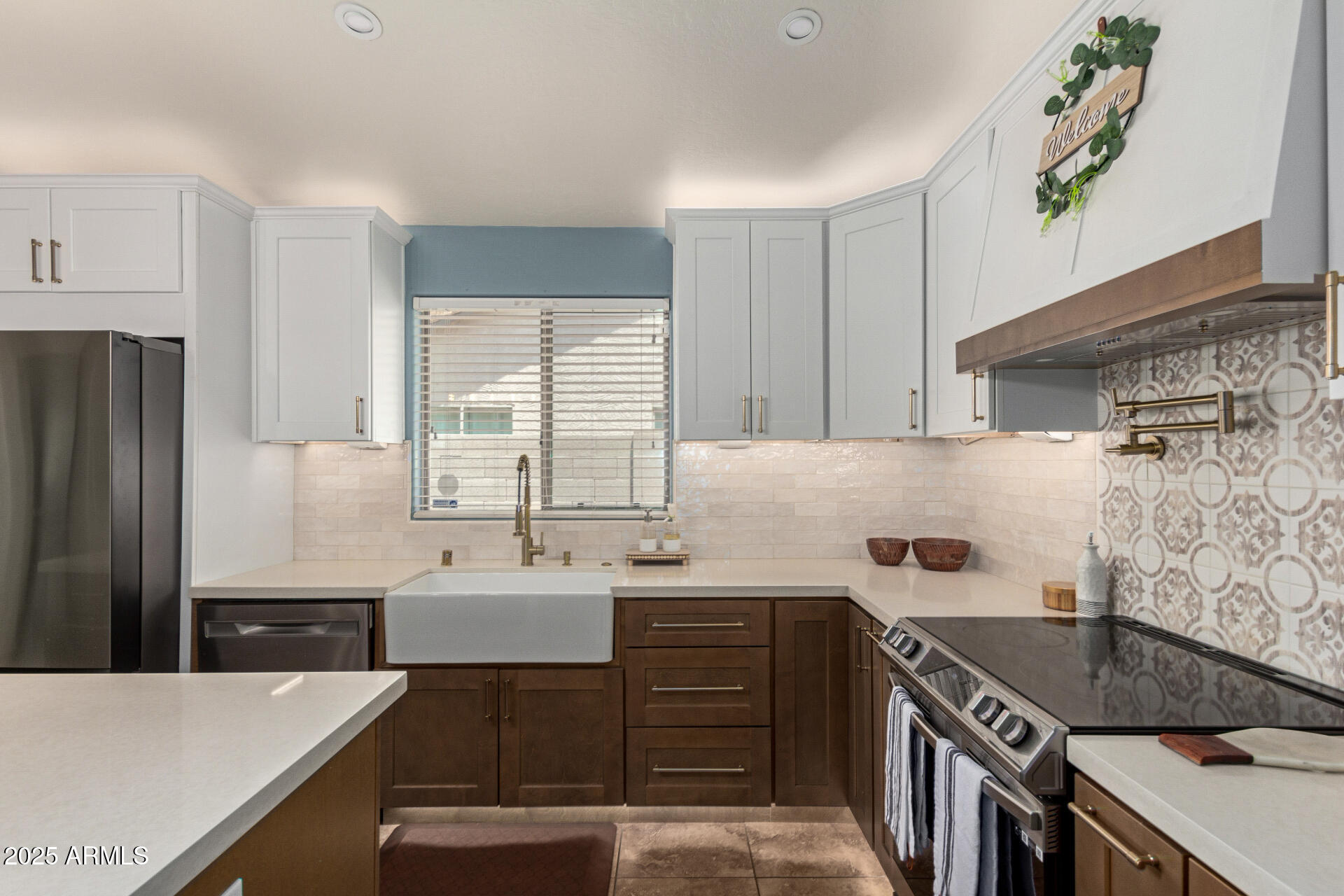 4518 West Carson Road Laveen, AZ 85339 - Photo 8 of 33 a kitchen with a sink stove and refrigerator