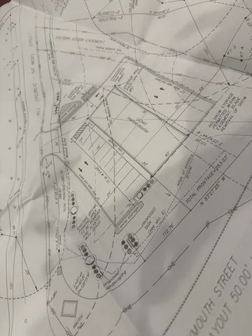 a dirty bathroom with white tiles