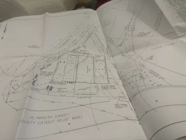 a dirty bathroom with white tiles