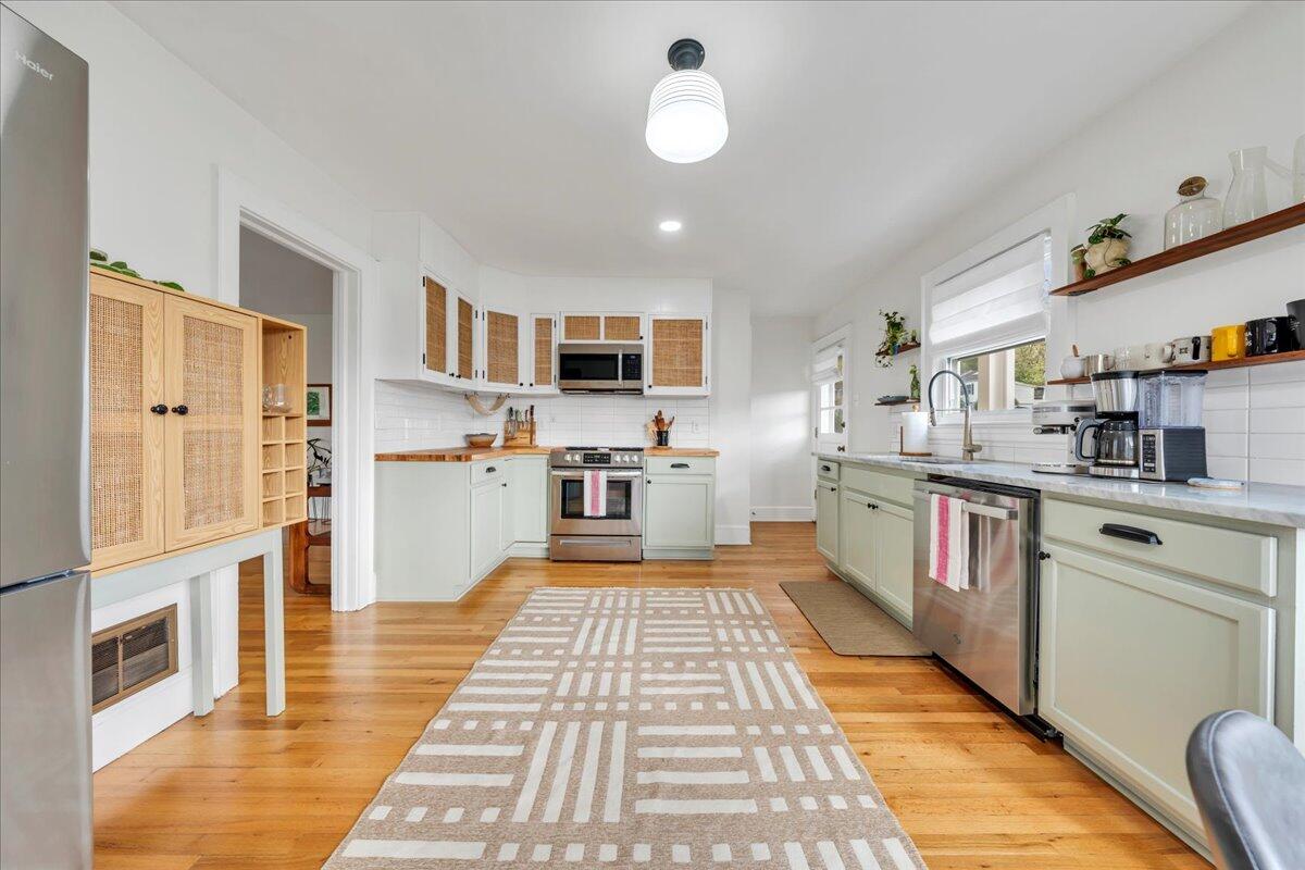 5120 Starkey Road Roanoke, VA 24018 - Photo 17 of 43 a kitchen with stainless steel appliances granite countertop a sink and cabinets