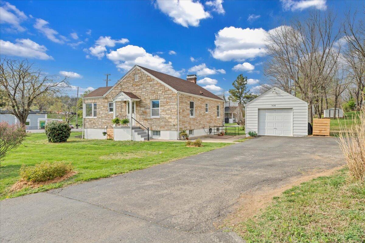 5120 Starkey Road Roanoke, VA 24018 - Photo 34 of 43 a front view of a house with garden