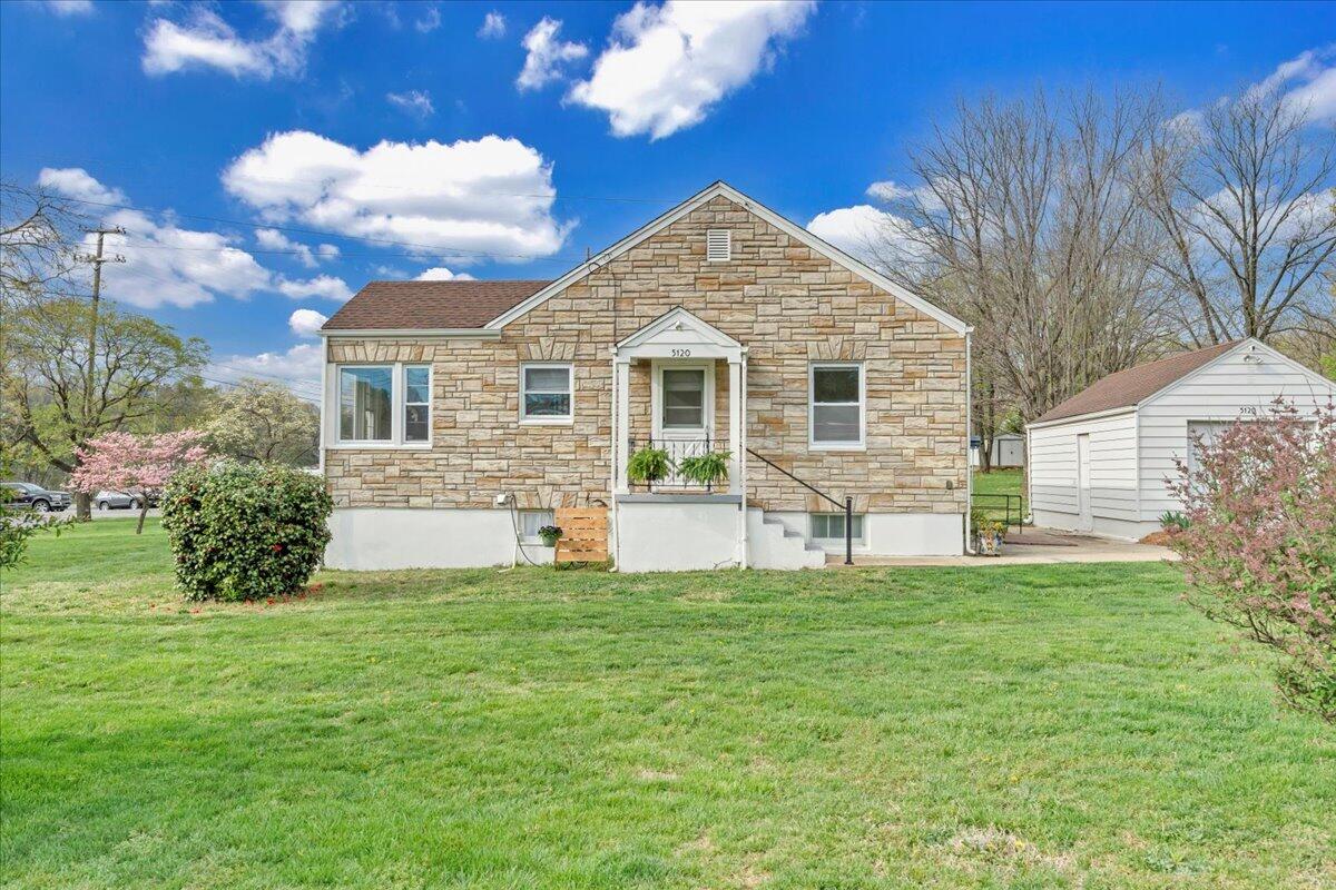 5120 Starkey Road Roanoke, VA 24018 - Photo 35 of 43 a front view of a house with a garden