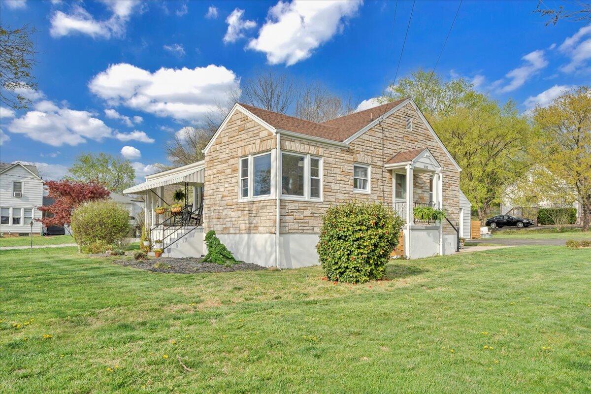 5120 Starkey Road Roanoke, VA 24018 - Photo 36 of 43 a view of a house with a yard
