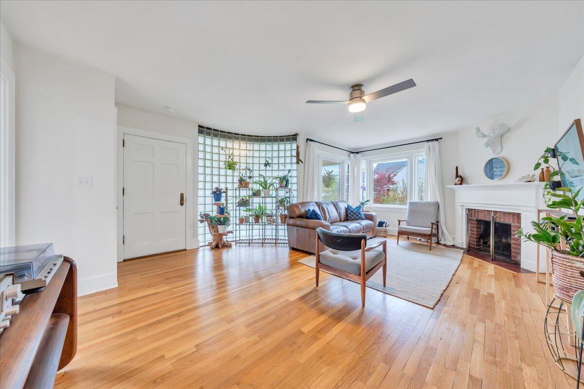 5120 Starkey Road Roanoke, VA 24018 - Photo 9 of 43 a living room with furniture and a fireplace