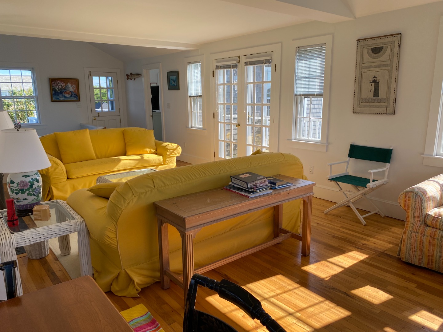 76 Baxter Road Nantucket, MA 02554 - Photo 20 of 25 a bedroom with a bed and wooden floor