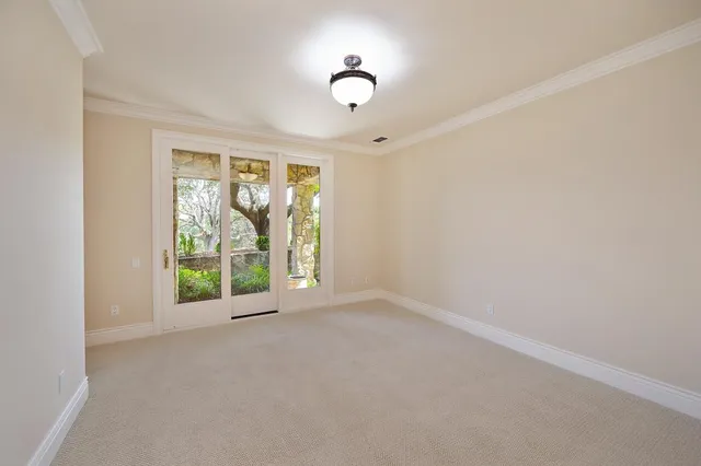 a view of a golf course with a lake