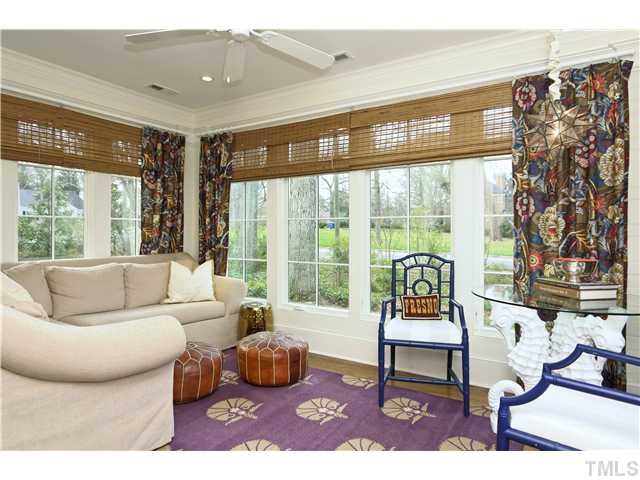 1501 Canterbury Road Raleigh, NC 27608 - Photo 4 of 25 a living room with furniture and a large window
