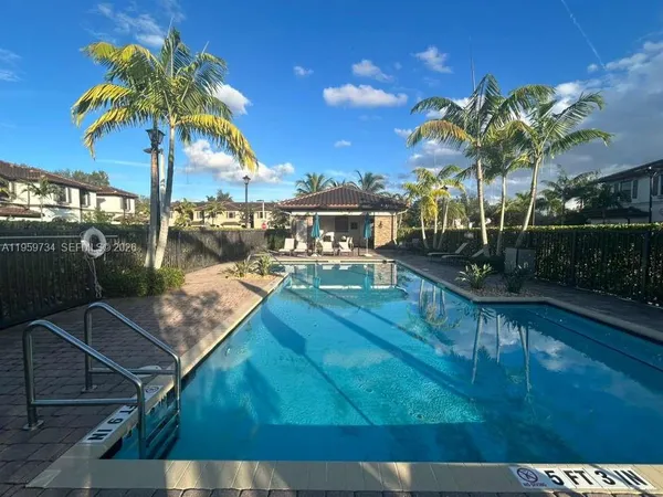a view of a balcony with chairs