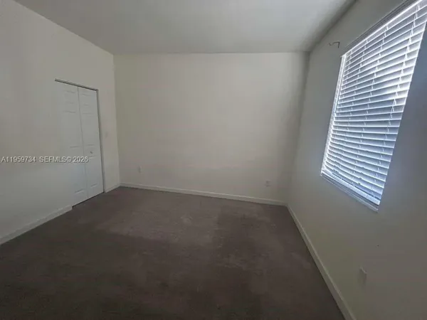 an empty room with a window