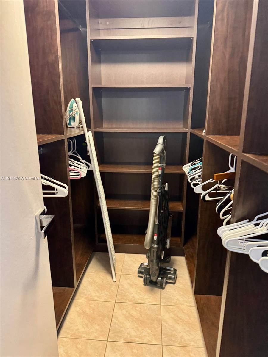 201 180th Drive, Unit 114 Sunny Isles Beach, FL 33160 - Photo 28 of 29 a view of storage and utility room