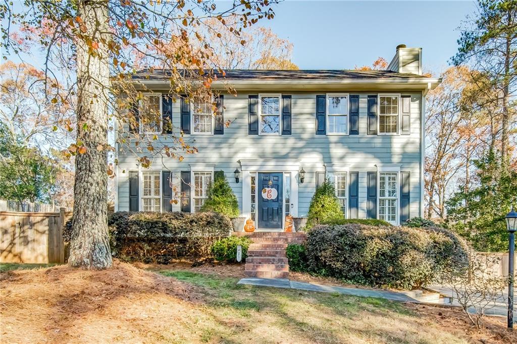 175 Farm Track Roswell, GA 30075 - Photo 1 of 1 a view of a building with a yard
