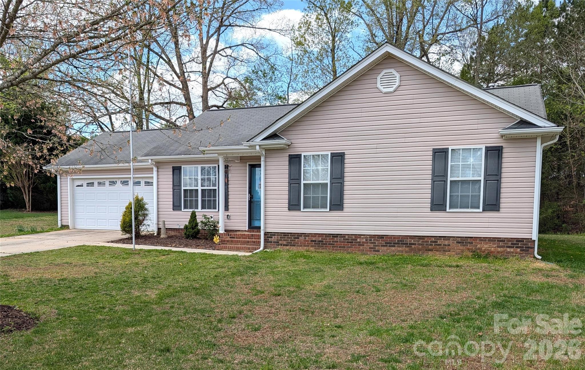 505 Azure Avenue Albemarle, NC 28001 - Photo 1 of 20 a front view of house with yard and seating space
