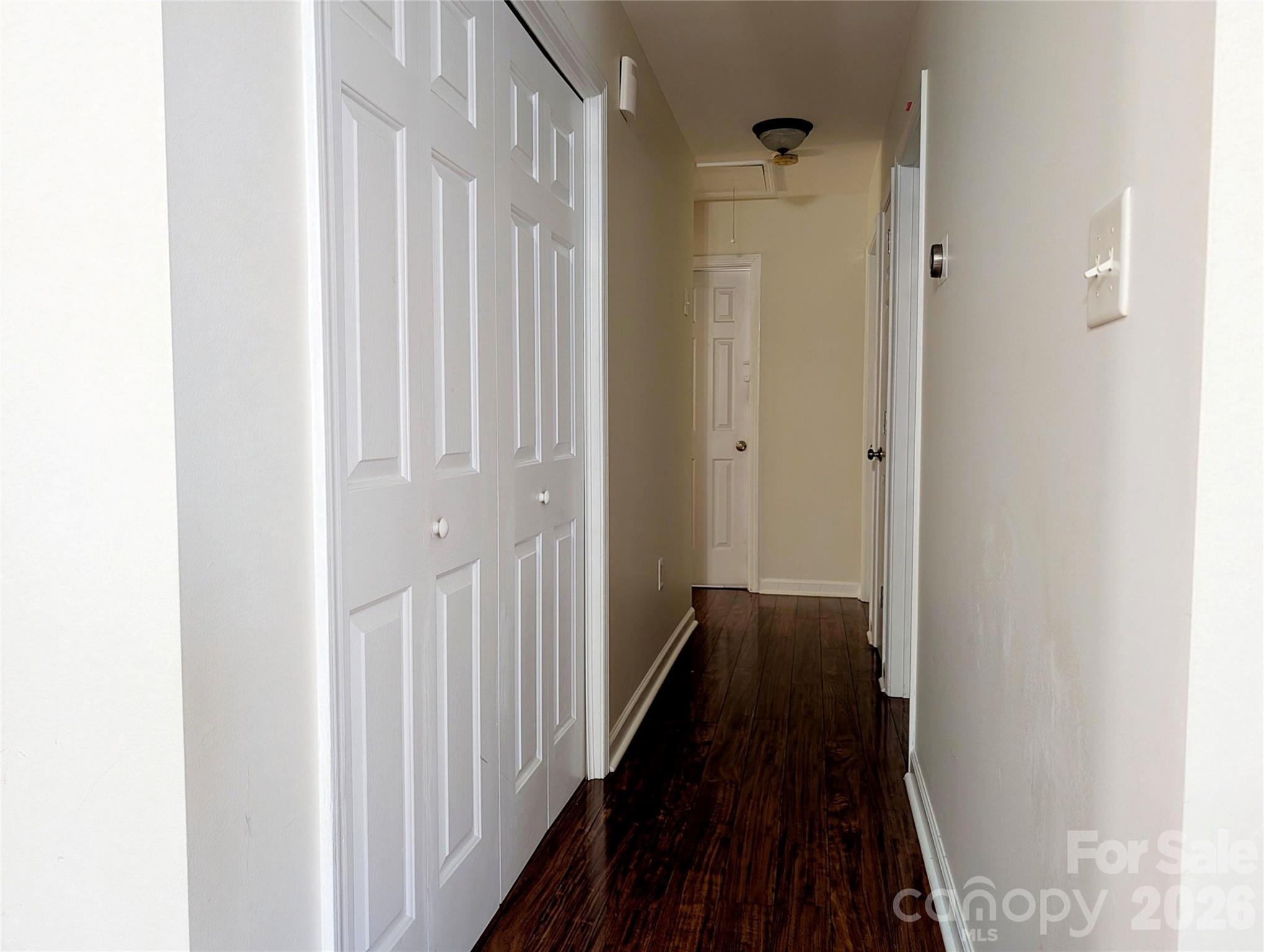 505 Azure Avenue Albemarle, NC 28001 - Photo 15 of 20 a view of a hallway with wooden floor
