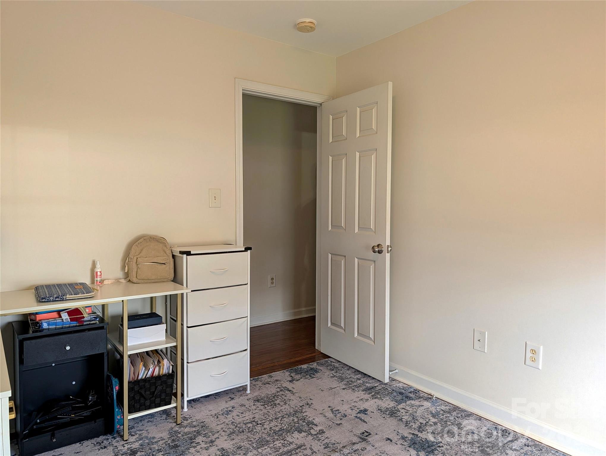 505 Azure Avenue Albemarle, NC 28001 - Photo 16 of 20 a bed room with a bed and cabinets