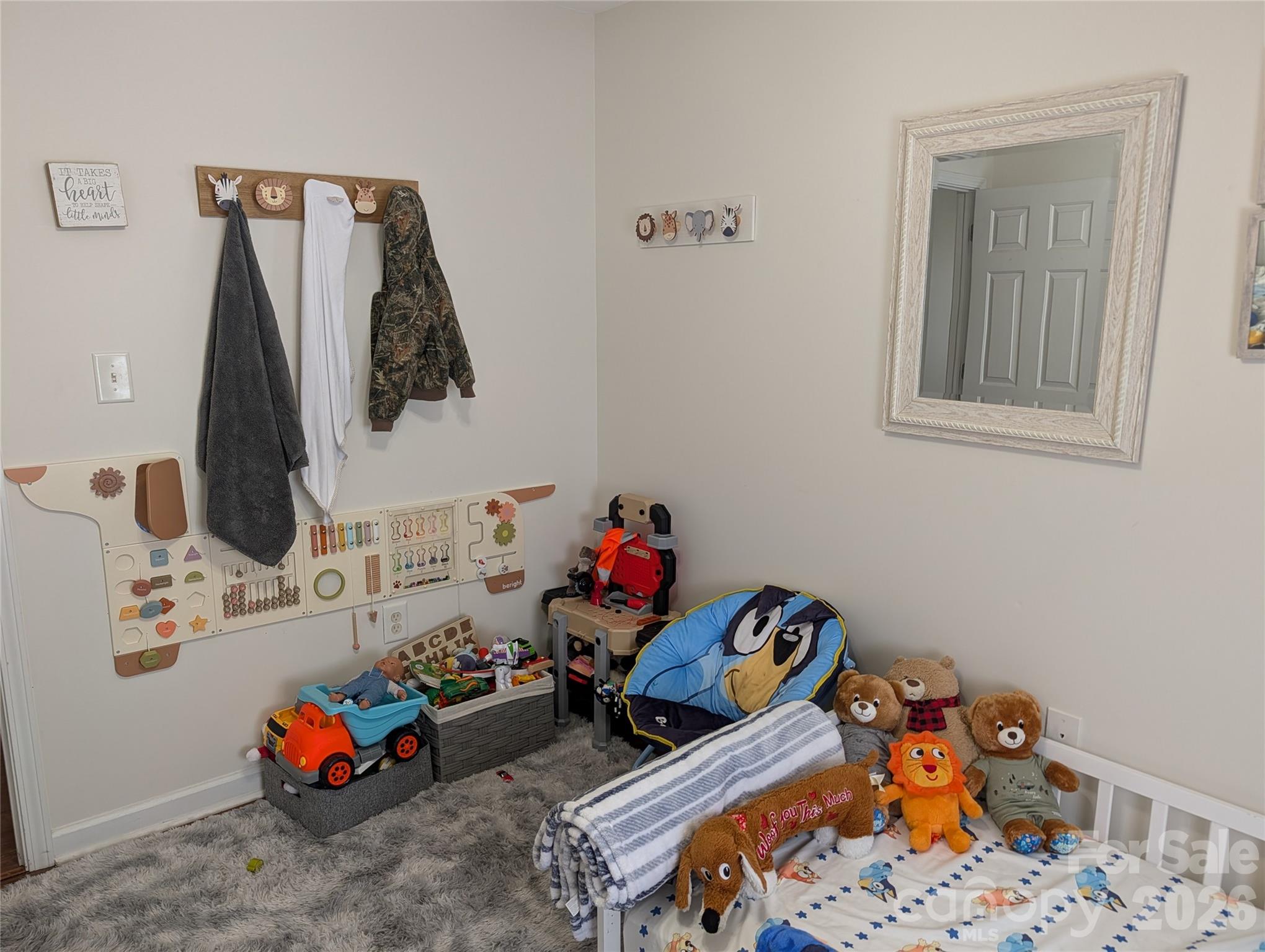 505 Azure Avenue Albemarle, NC 28001 - Photo 18 of 20 a room with toys and wooden floor