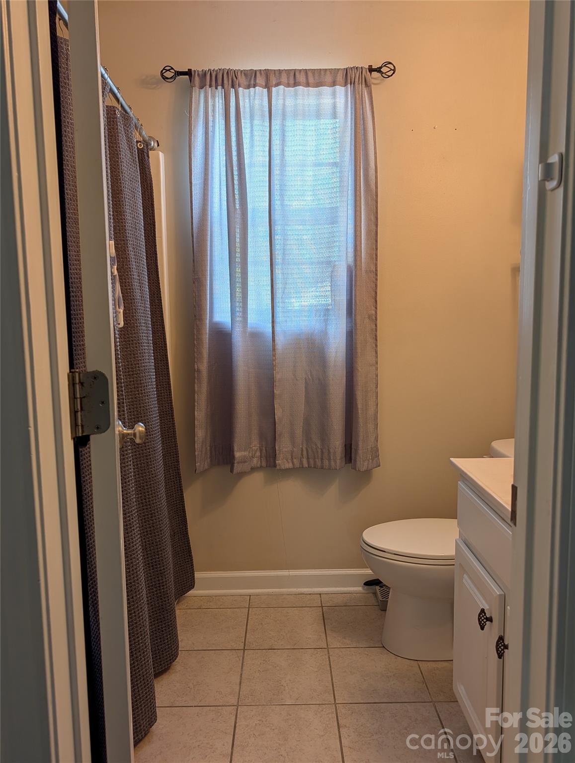 505 Azure Avenue Albemarle, NC 28001 - Photo 20 of 20 a bathroom with a toilet and a shower