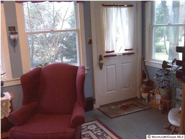 390 Bartley Road Jackson, NJ 08527 - Photo 3 of 3 a living room with furniture and a window
