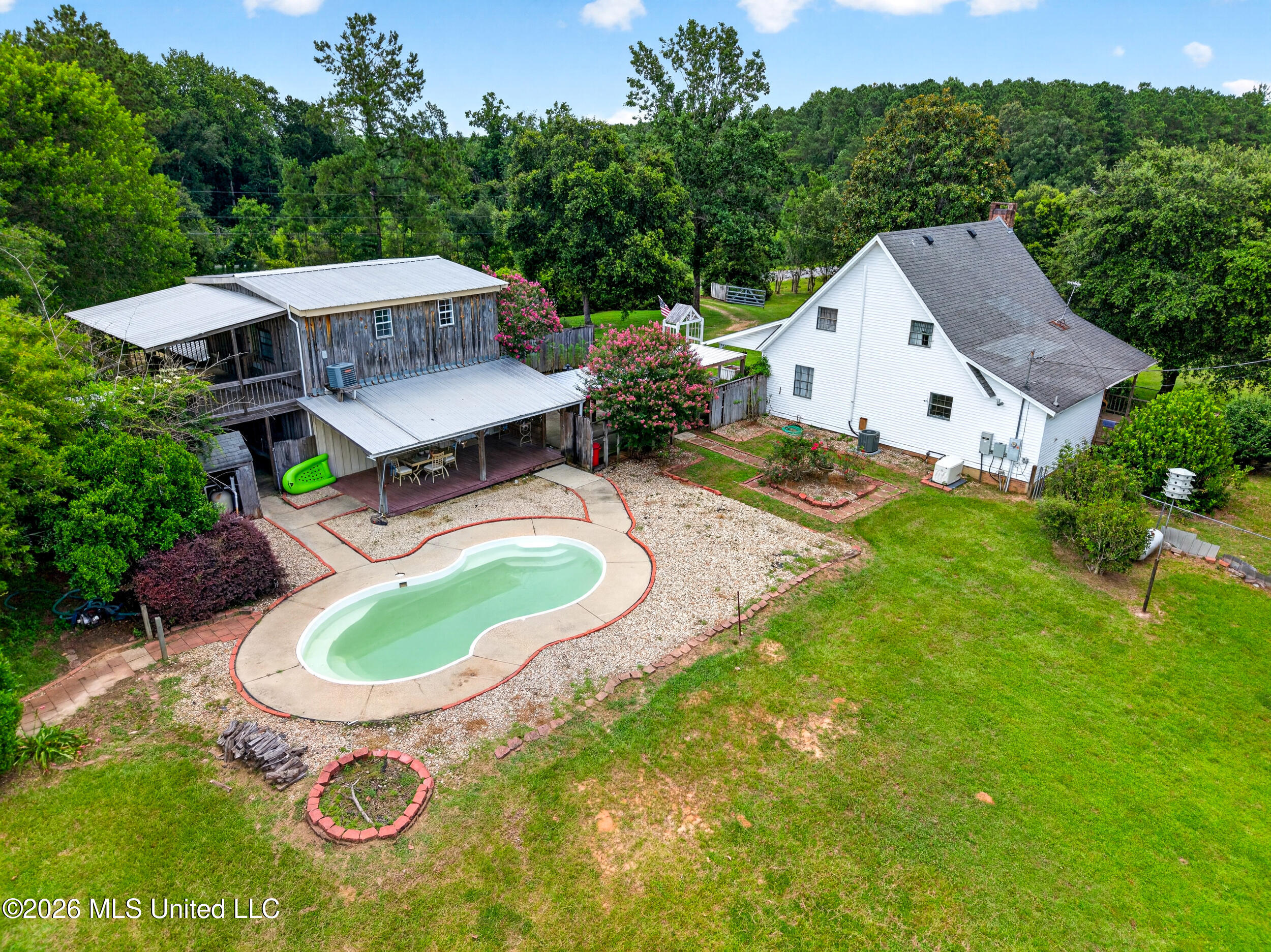 574 Slade Woodward Road Poplarville, MS 39470 - Photo 42 of 106 42_backyard_pool
