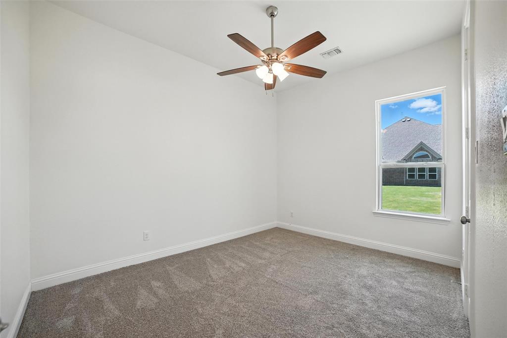 2616 Morning Mist Lane Nevada, TX 75173 - Photo 11 of 16 an empty room with a window