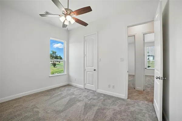 wooden floor in an empty room and a window