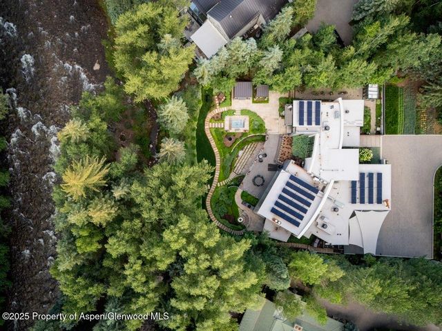a view of a chairs in a backyard