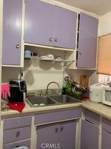 a view of a house with a road