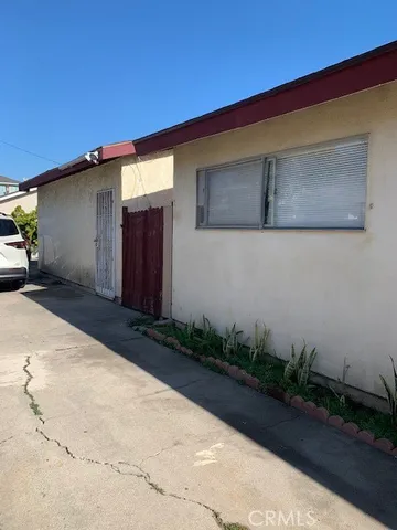 a view of a house with a street