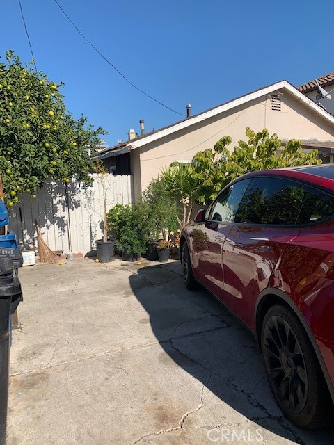 7161 Main Street Westminster, CA 92683 - Photo 9 of 21 a front view of a house with a garden