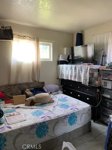 a bath room with a toilet and a bath tub