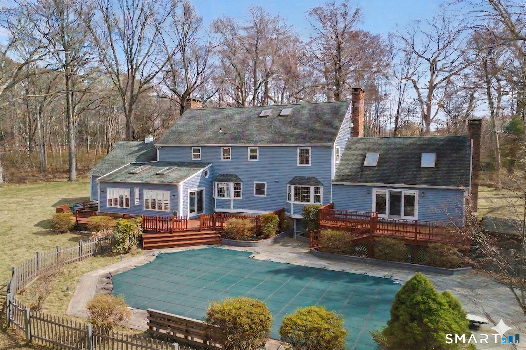 37 Lovers Lane Madison, CT 06443 - Photo 29 of 36 Back of home with in-ground pool