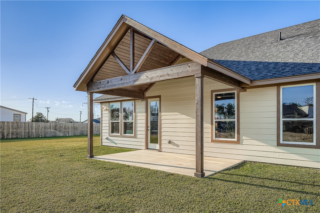 222 Arosa Drive Elgin, TX 78621 - Photo 4 of 40 a backyard of a house