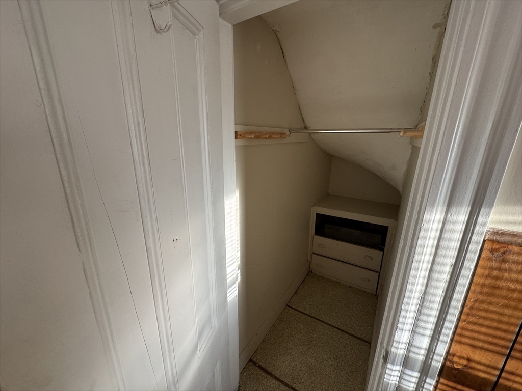377 Highland Avenue, Unit 1 Somerville, MA 02144 - Photo 22 of 25 a view of walk in closet