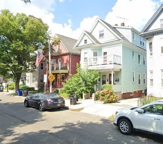 377 Highland Avenue, Unit 1 Somerville, MA 02144 - Photo 25 of 25 a view of a car parked in front of a building