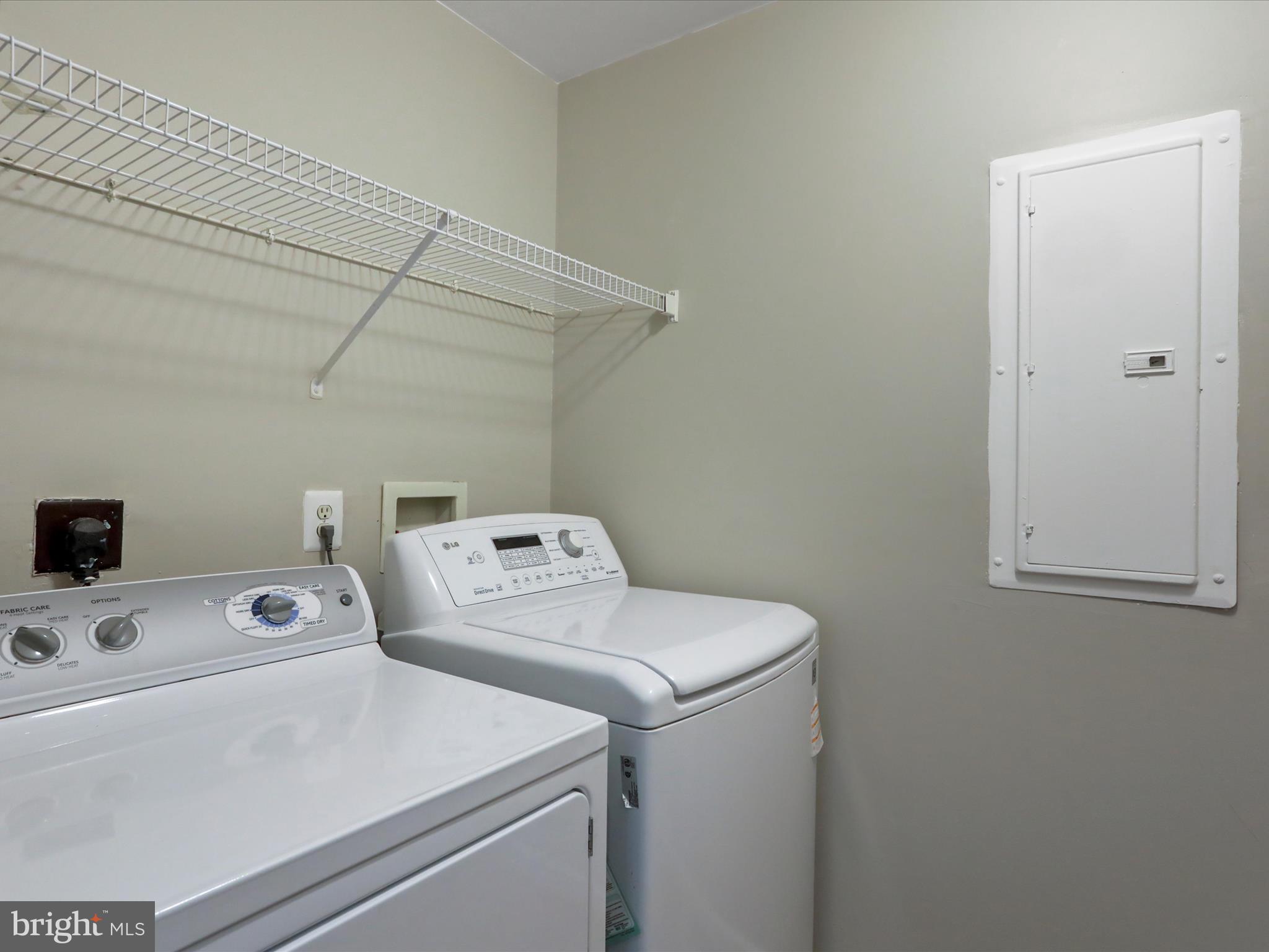 11312 King George Drive, Unit 4 Wheaton, MD 20902 - Photo 16 of 28 a utility room with dryer and washer