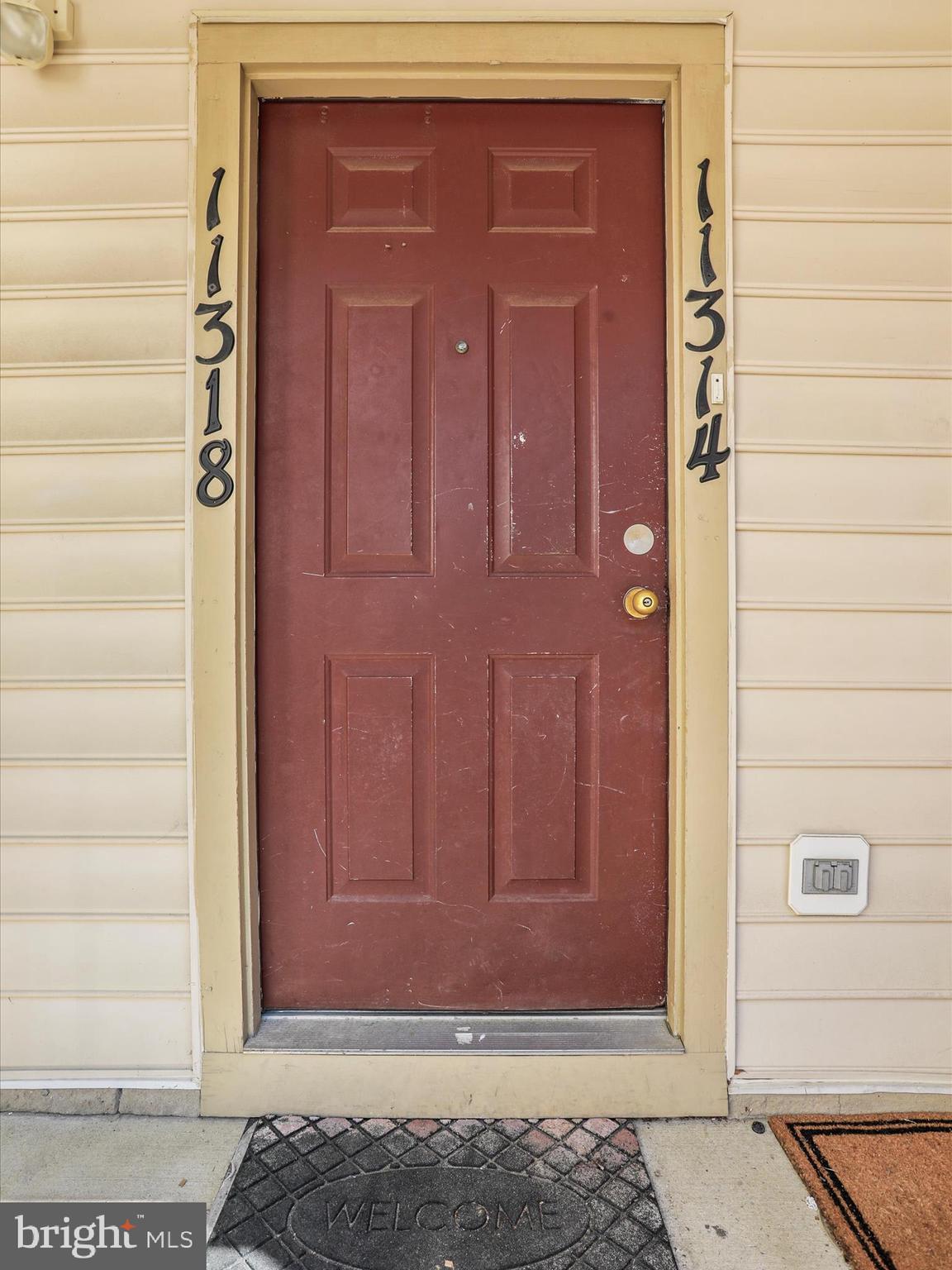 11312 King George Drive, Unit 4 Wheaton, MD 20902 - Photo 2 of 28 a view of door with wooden door