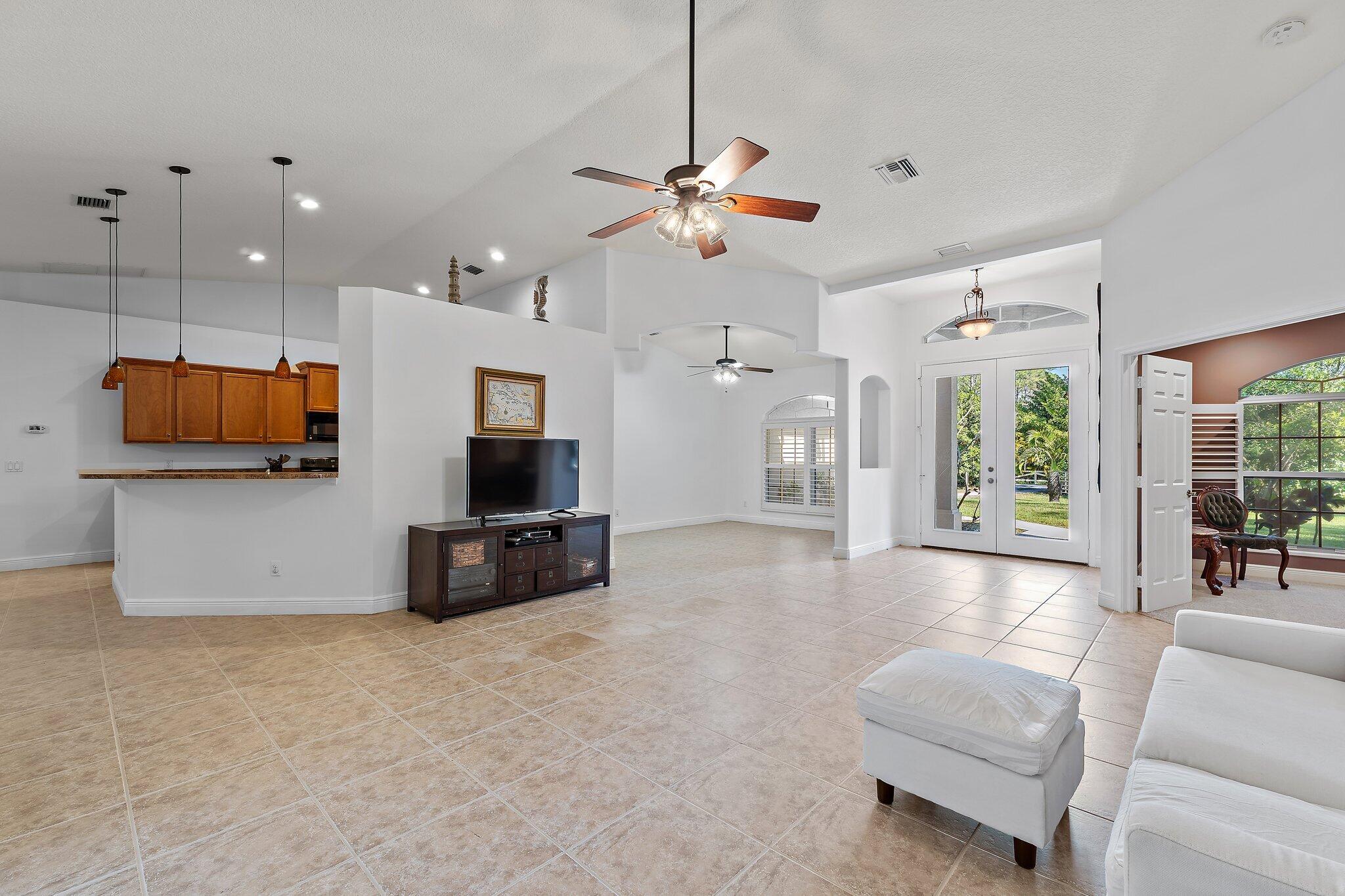 9608 Mockingbird Trail Jupiter, FL 33478 - Photo 20 of 49 Great room to kitch and dining