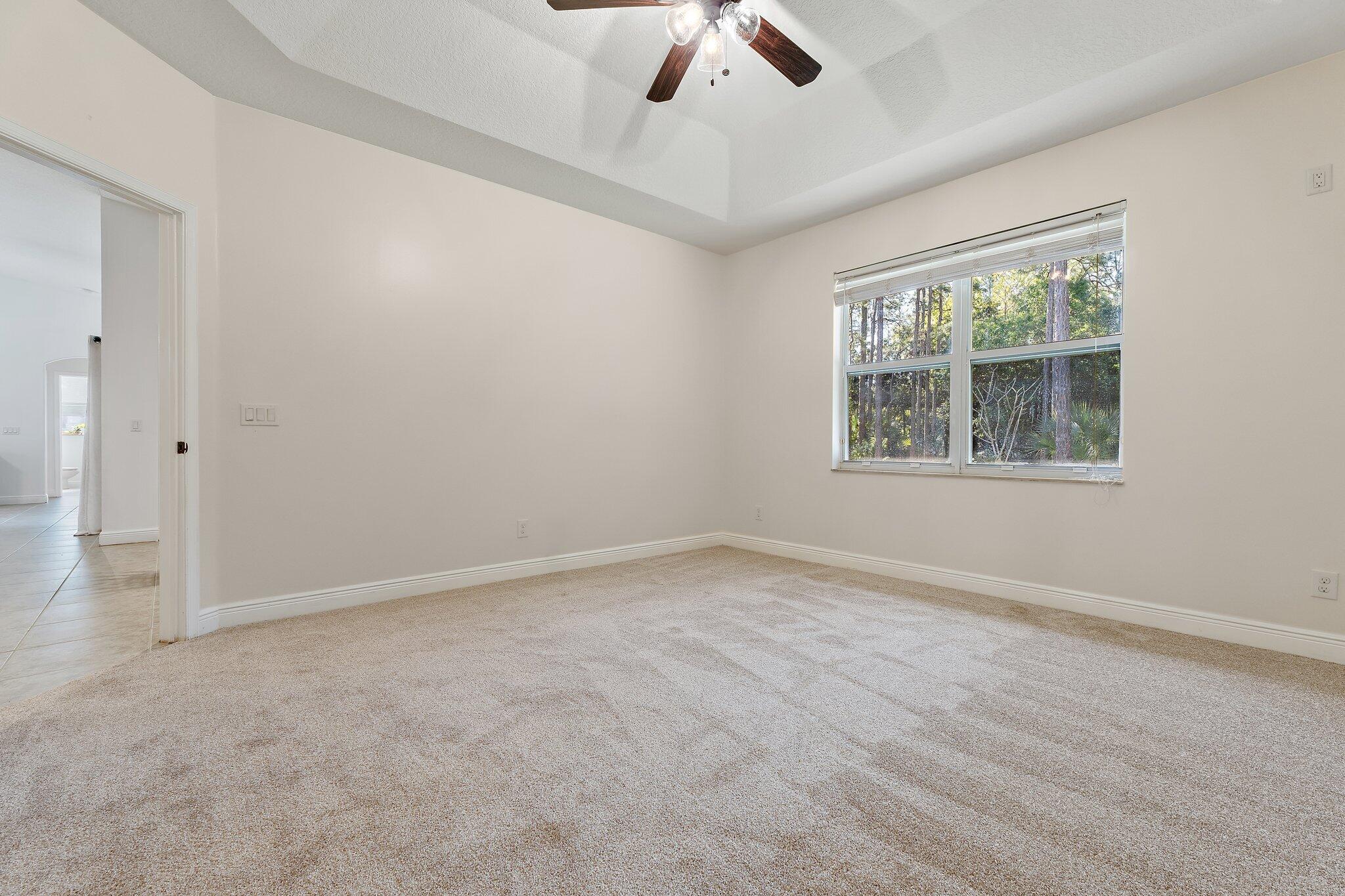 9608 Mockingbird Trail Jupiter, FL 33478 - Photo 26 of 49 Primary suite