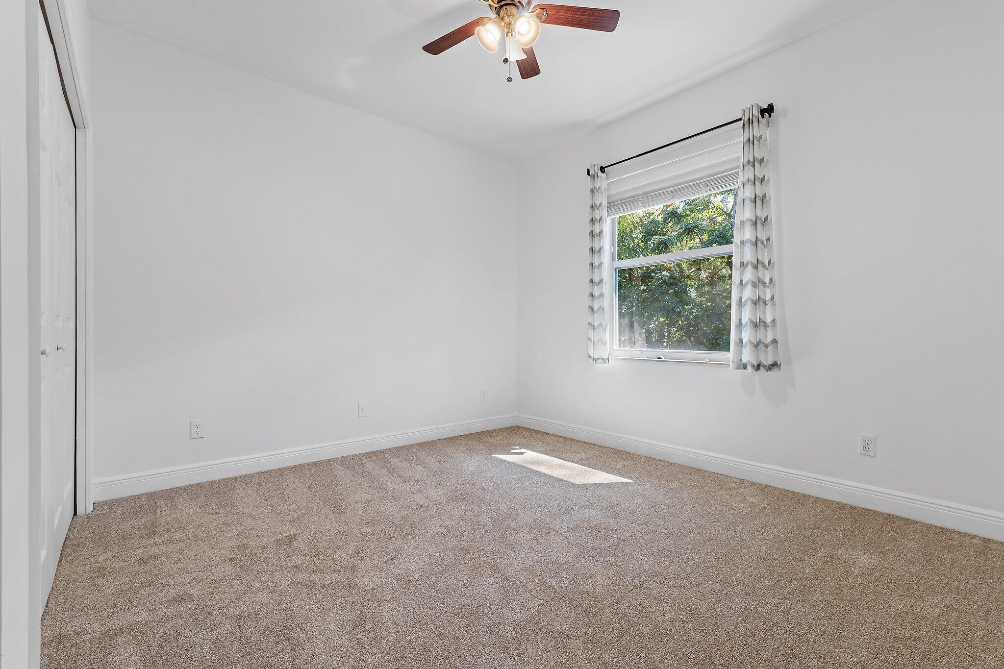 9608 Mockingbird Trail Jupiter, FL 33478 - Photo 31 of 49 Guest bedroom