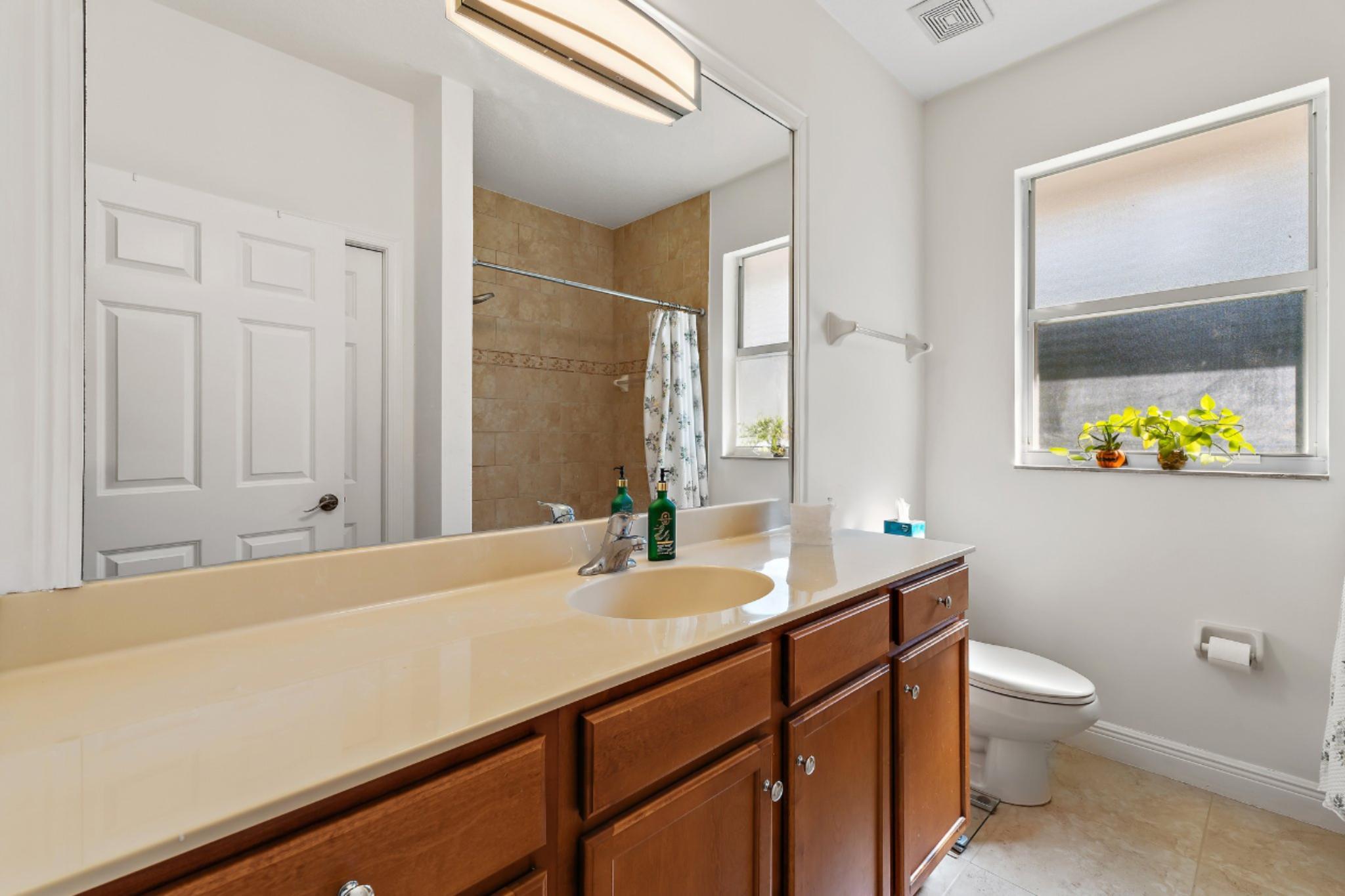 9608 Mockingbird Trail Jupiter, FL 33478 - Photo 33 of 49 Guest bath