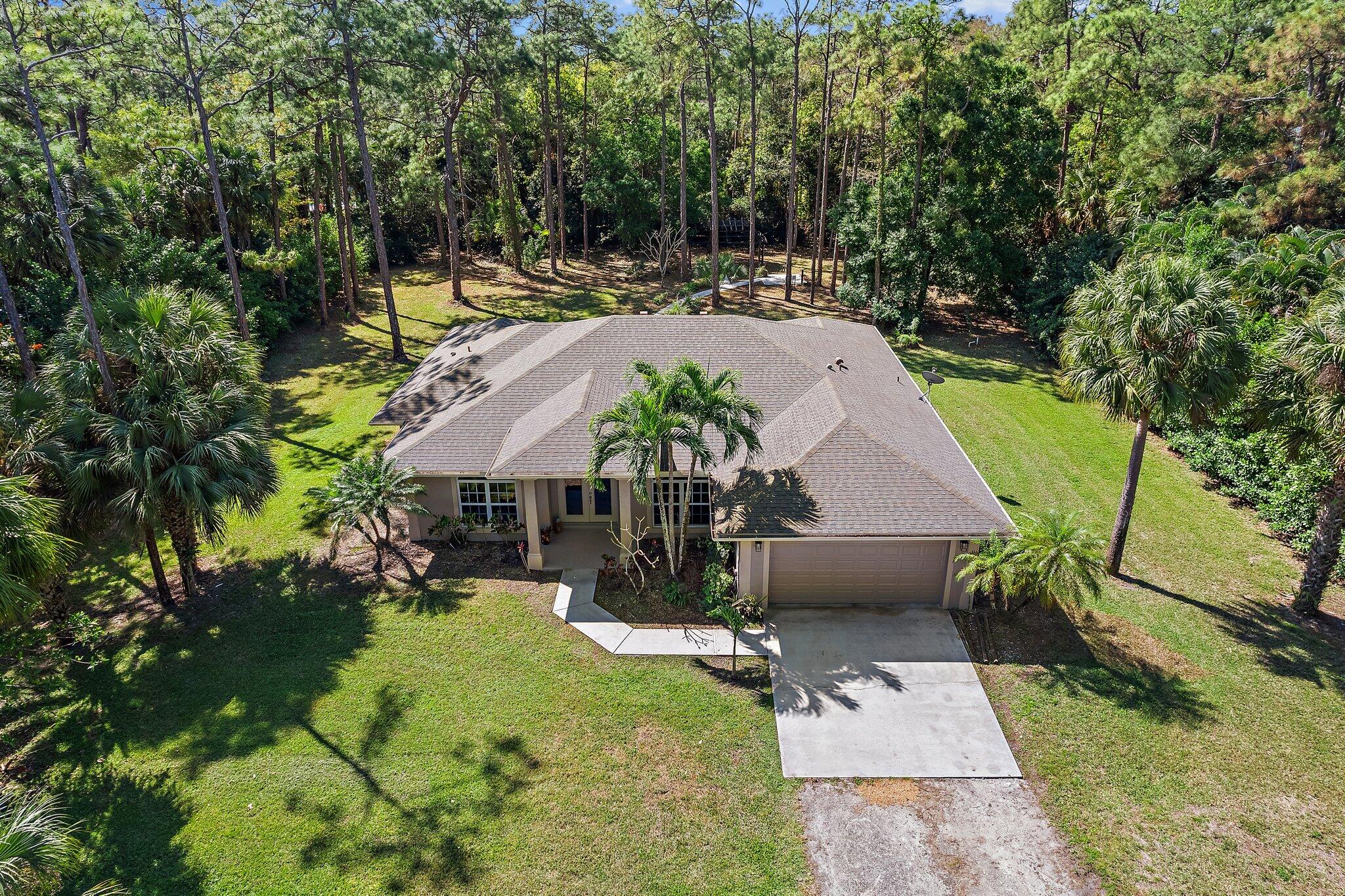 9608 Mockingbird Trail Jupiter, FL 33478 - Photo 5 of 49 Beautiful setting