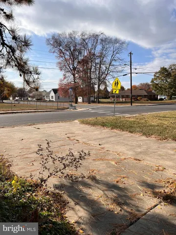 a view of a street with cars