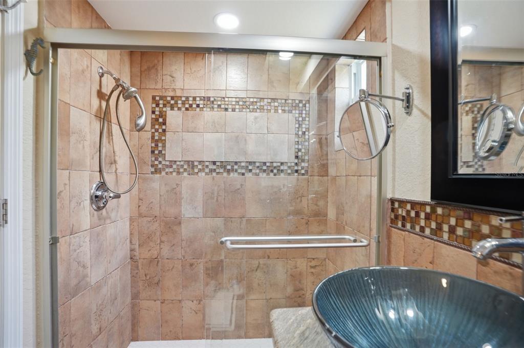 2658 Royal Ridge Drive Spring Hill, FL 34606 - Photo 14 of 38 a bathroom with a sink and a mirror