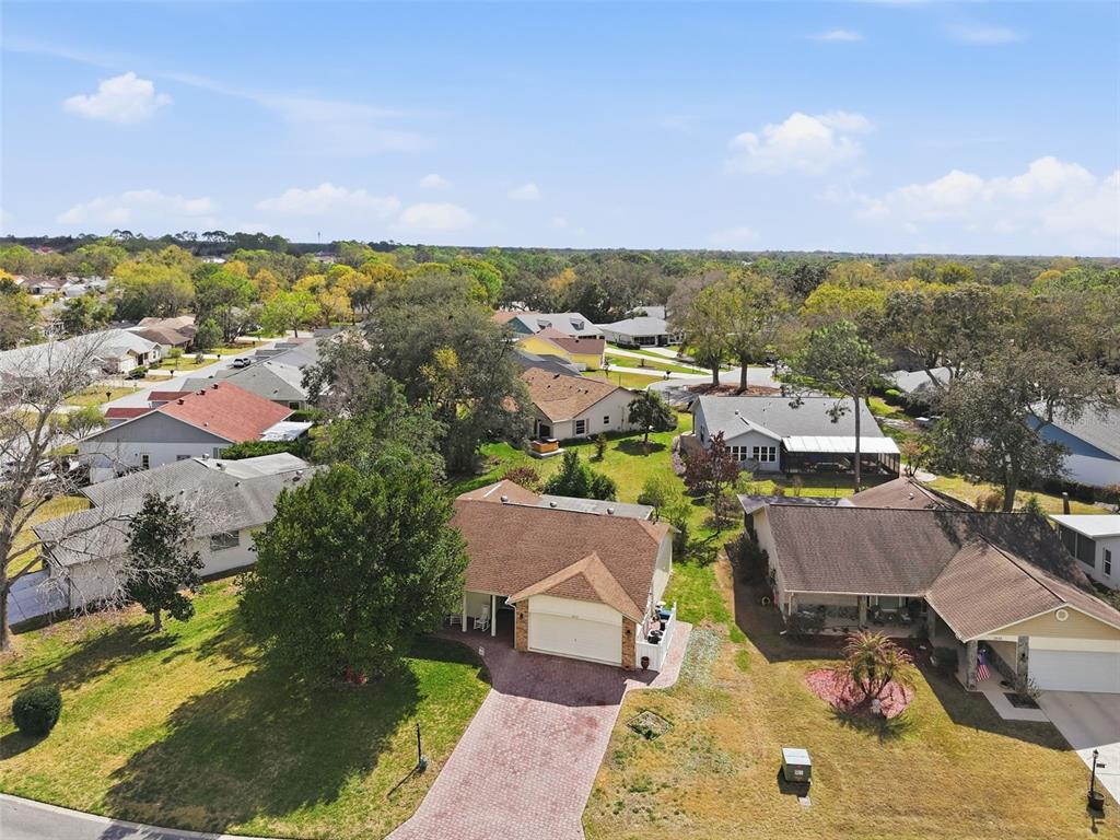 2658 Royal Ridge Drive Spring Hill, FL 34606 - Photo 25 of 38 an aerial view of a house with a garden