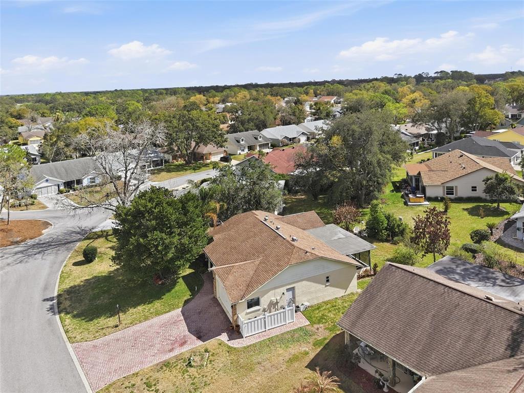 2658 Royal Ridge Drive Spring Hill, FL 34606 - Photo 27 of 38 an aerial view of residential houses with outdoor space and ocean view