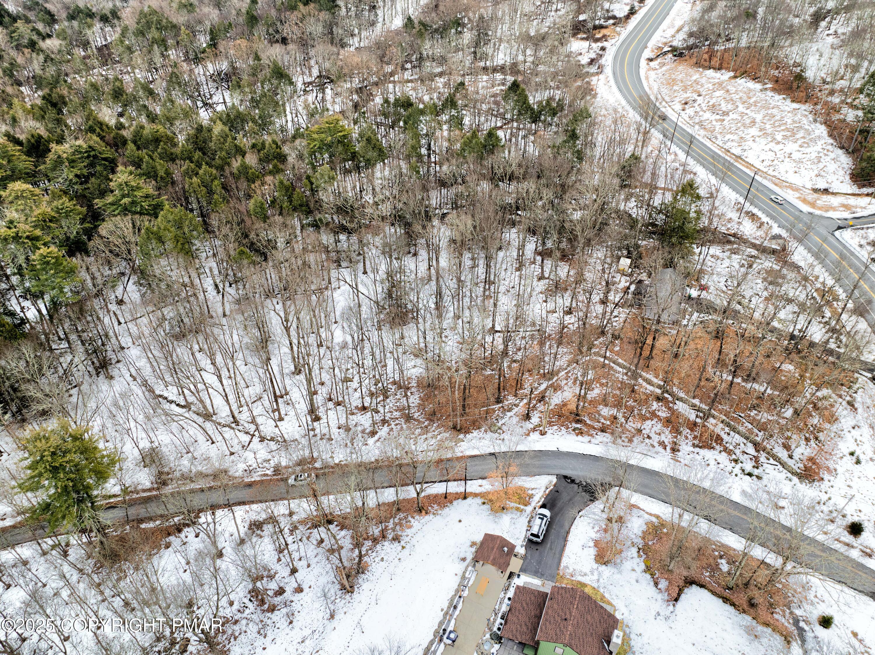Lot 679 Racoon Court Bushkill, PA 18324 - Photo 11 of 15 a view of water covered with snow in the background