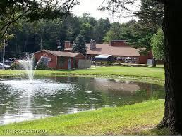 Lot 679 Racoon Court Bushkill, PA 18324 - Photo 15 of 15 a backyard of a house with yard and lake view