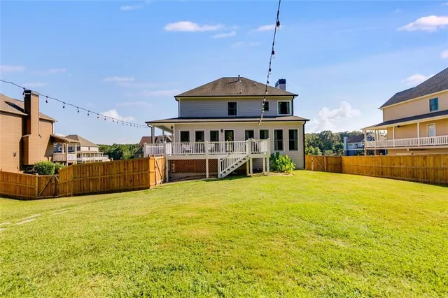 a front view of a building with a garden