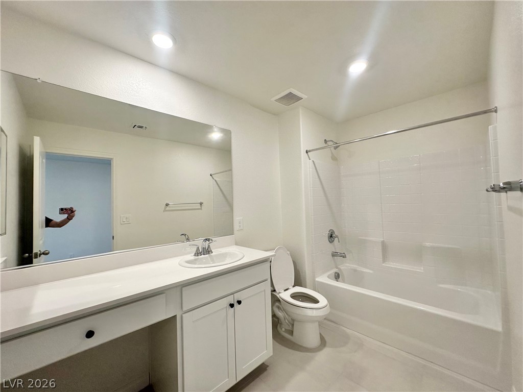 2121 Tricase Street Henderson, NV 89044 - Photo 23 of 31 Full bath featuring shower / tub combination, vanity, and toilet