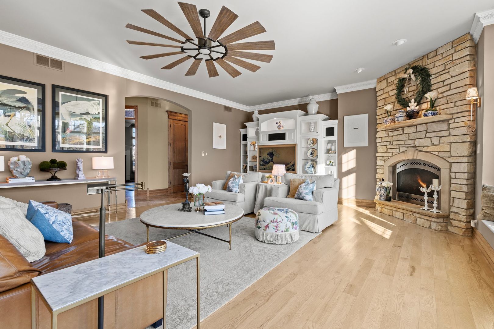 109 Singletree Road Orland Park, IL 60467 - Photo 15 of 66 a living room with furniture a fireplace and a flat screen tv